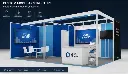 Straightforward modular booth with blue and white color scheme, open design, simple furniture arrangement, clean professional exhibition stand.webp